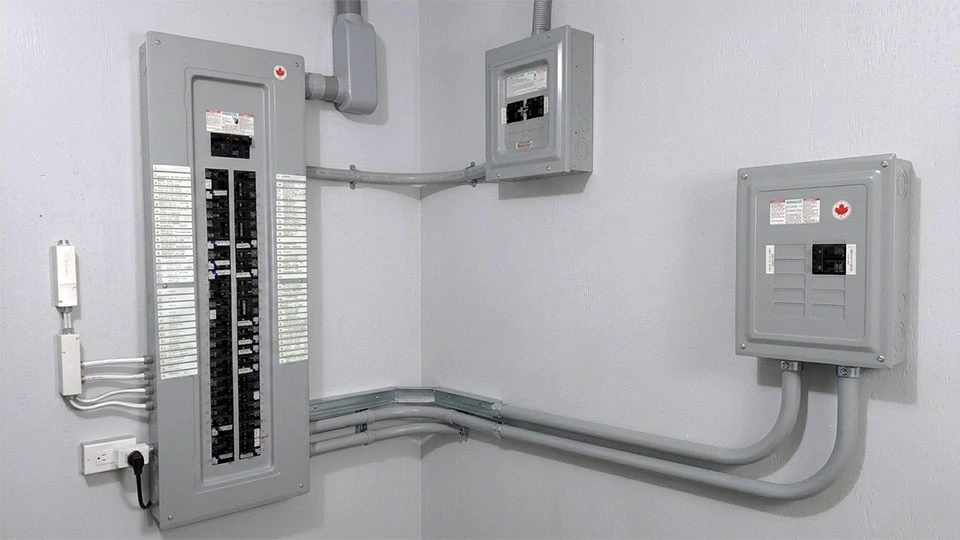 Residential electrical service panels installed for a high-capacity electrical service upgrade
